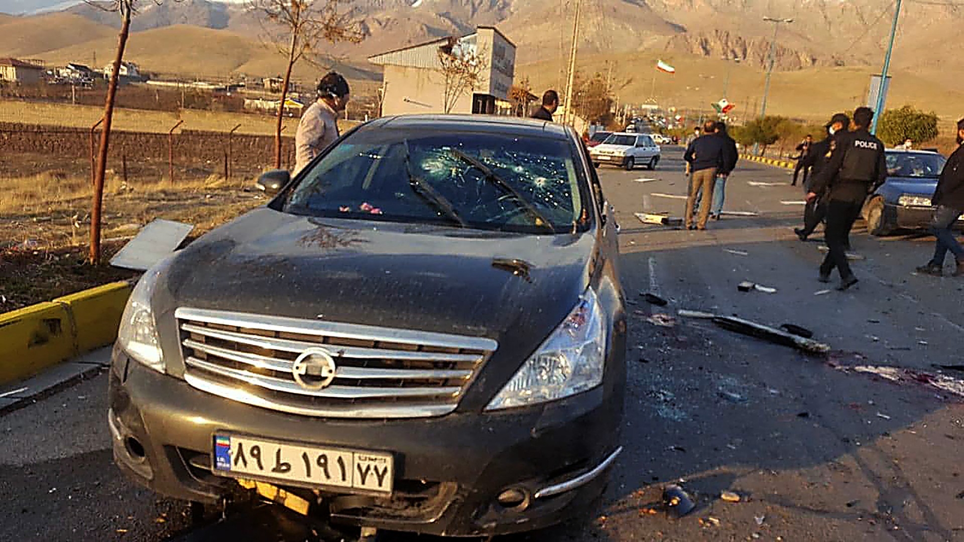 The damaged car of Iranian nuclear scientist Mohsen Fakhrizadeh after it was attacked near the capital Tehran (IRIB/AFP)