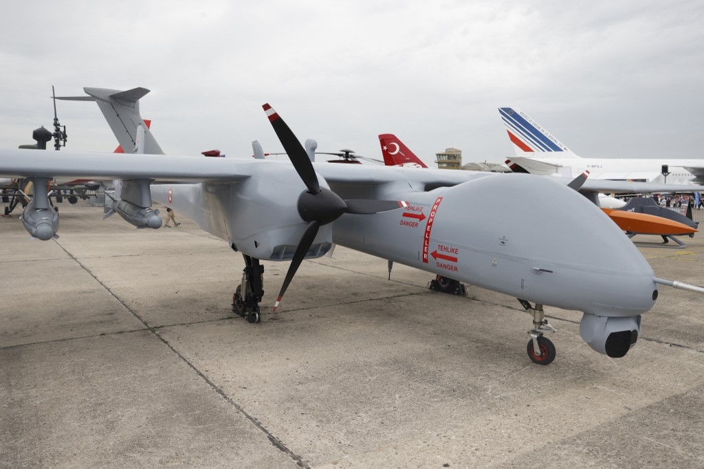 A T Aksungur, an unmanned aerial vehicle (UAV) developed by Turkish Aerospace industries (TAI), is displayed during the International Paris Air Show at the Paris–Le Bourget Airport, on June 20, 2023. (Geoffroy Van der Hasselt / AFP)