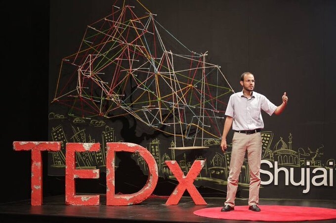A screenshot of a TEDx Talk on the power of storytelling featuring Palestinian academic and activist, Refaat Alareer, in Shujaiya, Gaza, in 2016 (YouTube)