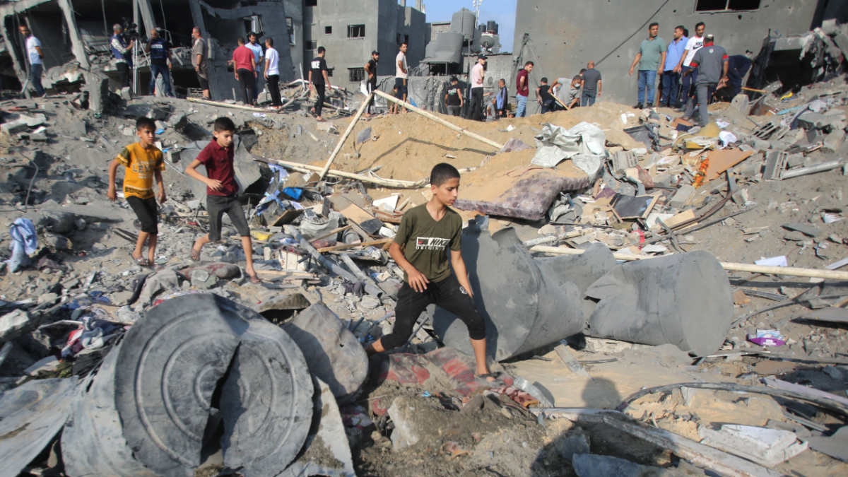 Palestinians check the destruction in the aftermath of an Israeli strike the previous night in the Jabalia camp for Palestinian refugees in the Gaza Strip, on 1 November 2023 (AFP)