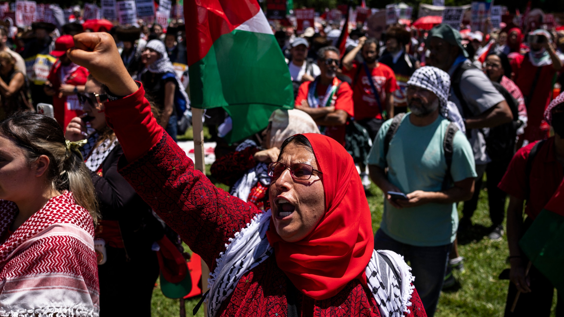 Pro-Palestinian protesters chant during a demonstration in Lafayette Park in front of the White House to demand an end to US support for Israel's war in Gaza on 8 June 2024 in Washington, DC (Samuel Corum/Getty Images via AFP)