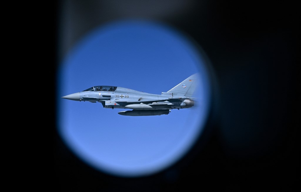 A German Air Force Eurofighter Typhoon fighter participates in a Nato Air Policing mission exercise on 4 July 2023 (John Thys/AFP)