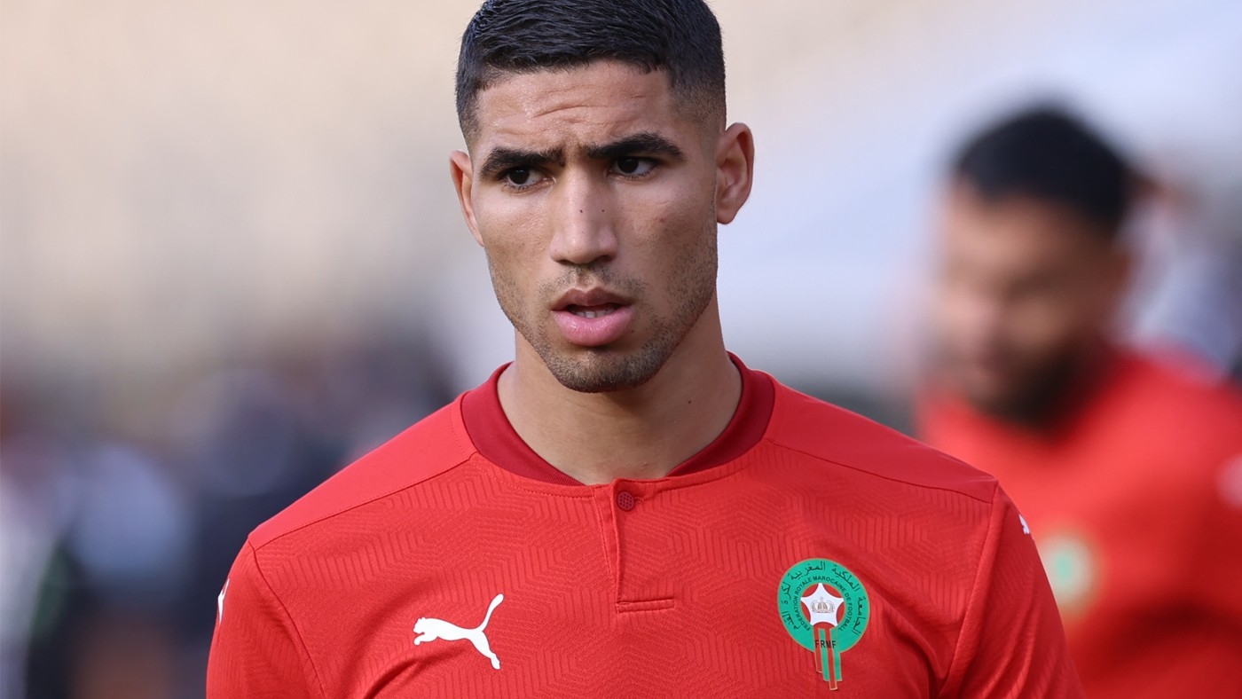 Morocco's defender Achraf Hakimi warms up ahead of the Africa Cup of Nations (CAN) 2021 football match between Morrocco and Ghana at Ahmadou Ahidjo stadium in Yaounde (AFP)
