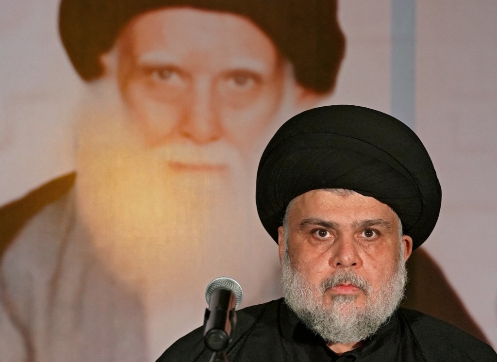 Iraqi Shia cleric Muqtada al-Sadr delivers a speech in the Iraqi city of Najaf on 3 June 2022 (AFP)