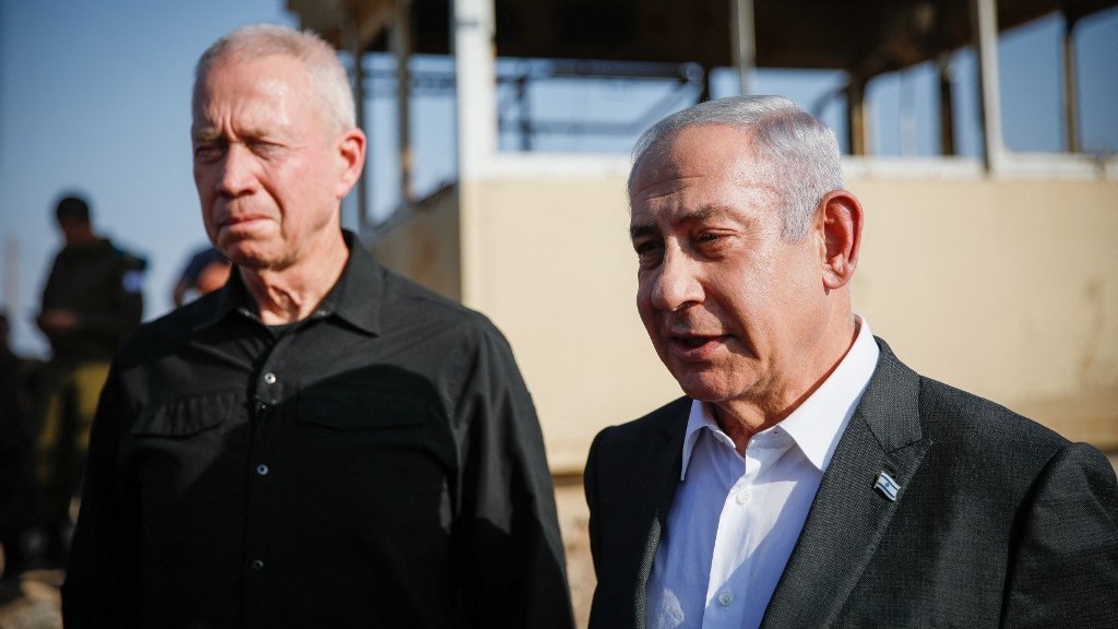 Israeli Prime Minister Benjamin Netanyahu and former Defence Minister Yoav Galant seen in the occupied West Bank in July 2023 (Shir Torem/AFP)