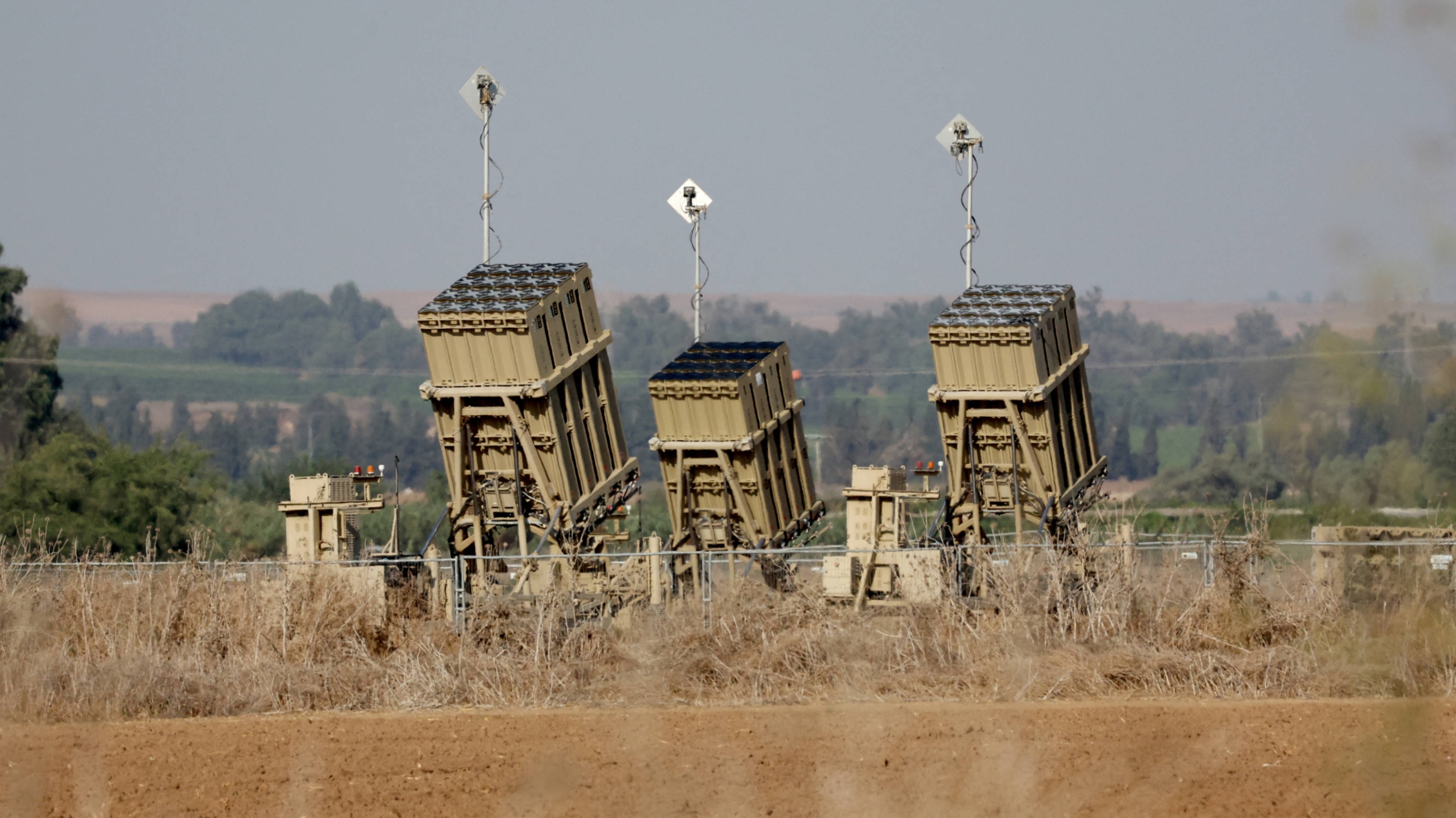 Israel's Iron Dome defence missile system is on alert, stationed close to the southern Israeli town of Sderot on 12 October 2023 (AFP)