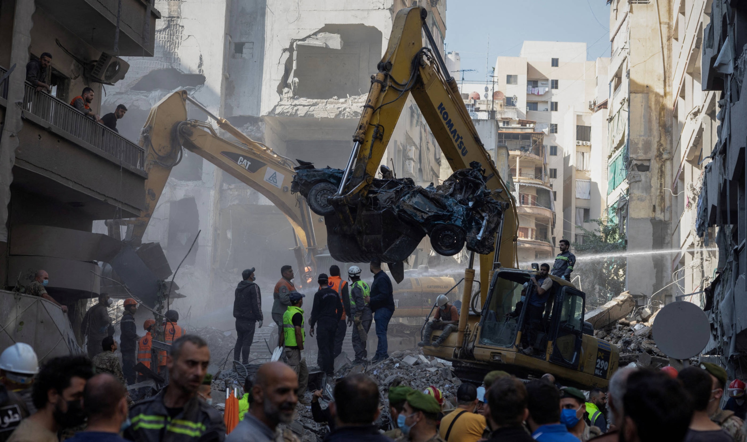 Civil defence members work at the site of an Israeli strike in Beirut's Basta al-Fawqa neighbourhood, Lebanon, on 23 November 2024 (Reuters)