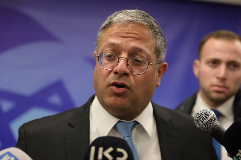 Israeli Minister of National Security Itamar Ben-Gvir speaks to the media ahead of the weekly cabinet meeting in the prime minister's office in Jerusalem, 19 March 2023 (AFP)