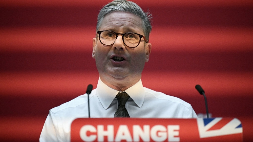 Keir Starmer delivers a speech at the launch of the Labour election manifesto in Manchester last month (Oli Scarff/AFP)