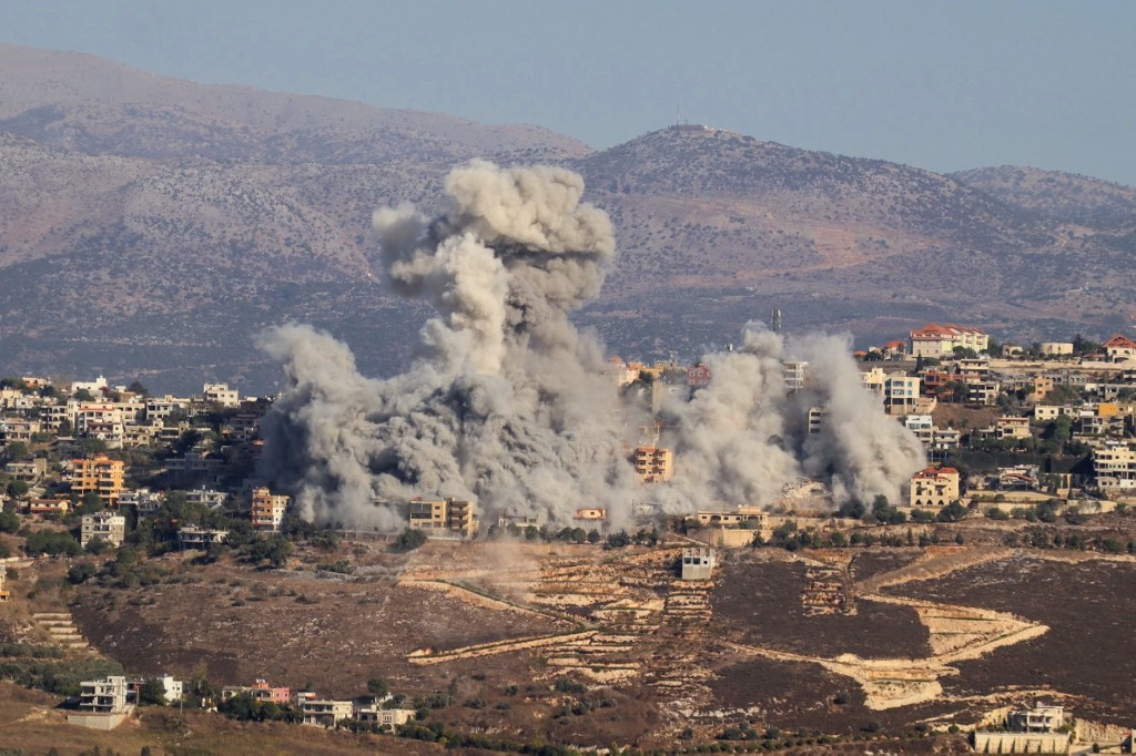 Smoke billows during an Israeli airstrike on the the southern Lebanese village of Khiam near the border with Israel on October 3, 2024 (AFP)