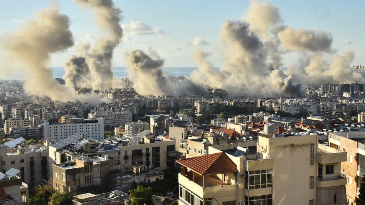 Smoke billows above Beirut’s southern suburbs following an Israeli airstrike on November 26, 2024 (Fadel Itani/AFP)