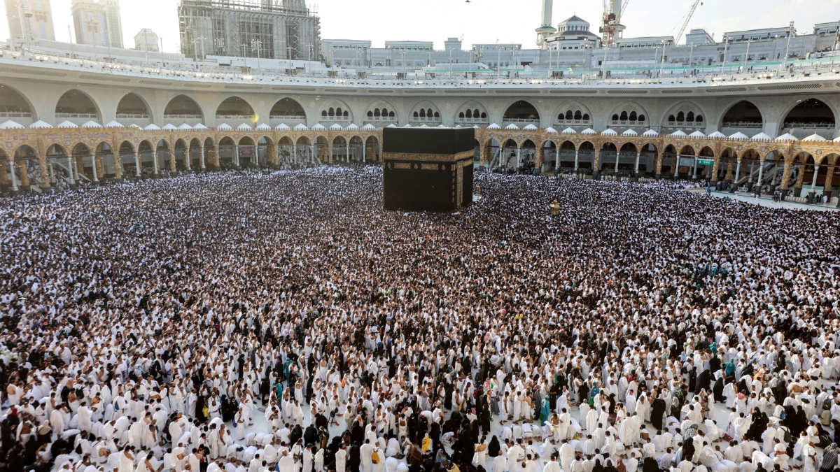 Muslim worshippers gather to pray around the Kaaba, Islam's holiest site, on the last Friday of the holy month of Ramadan on 5 April 2024.