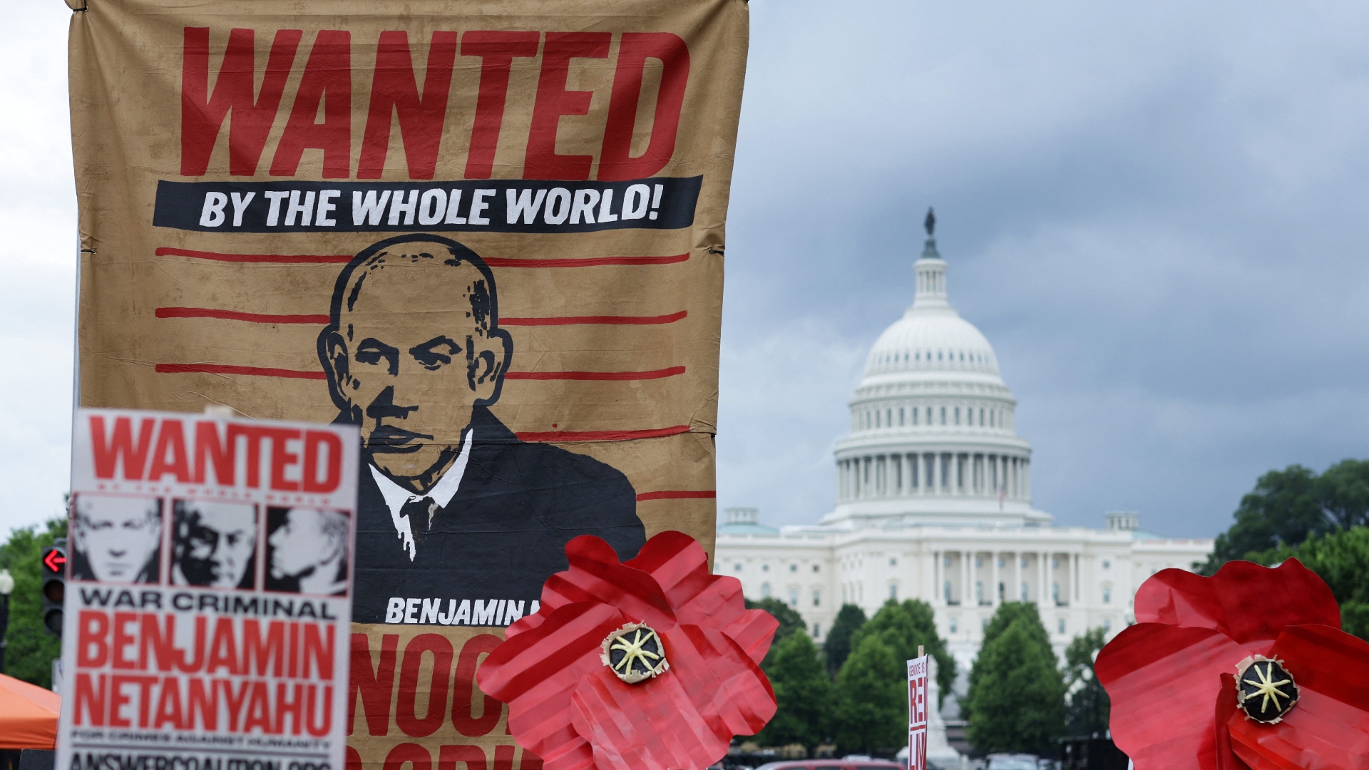 Activists participate in a demonstration near the US Capitol to protest the visit of Israeli Prime Minister Benjamin Netanyahu to Washington on 24 July (Alex Wong/Getty)