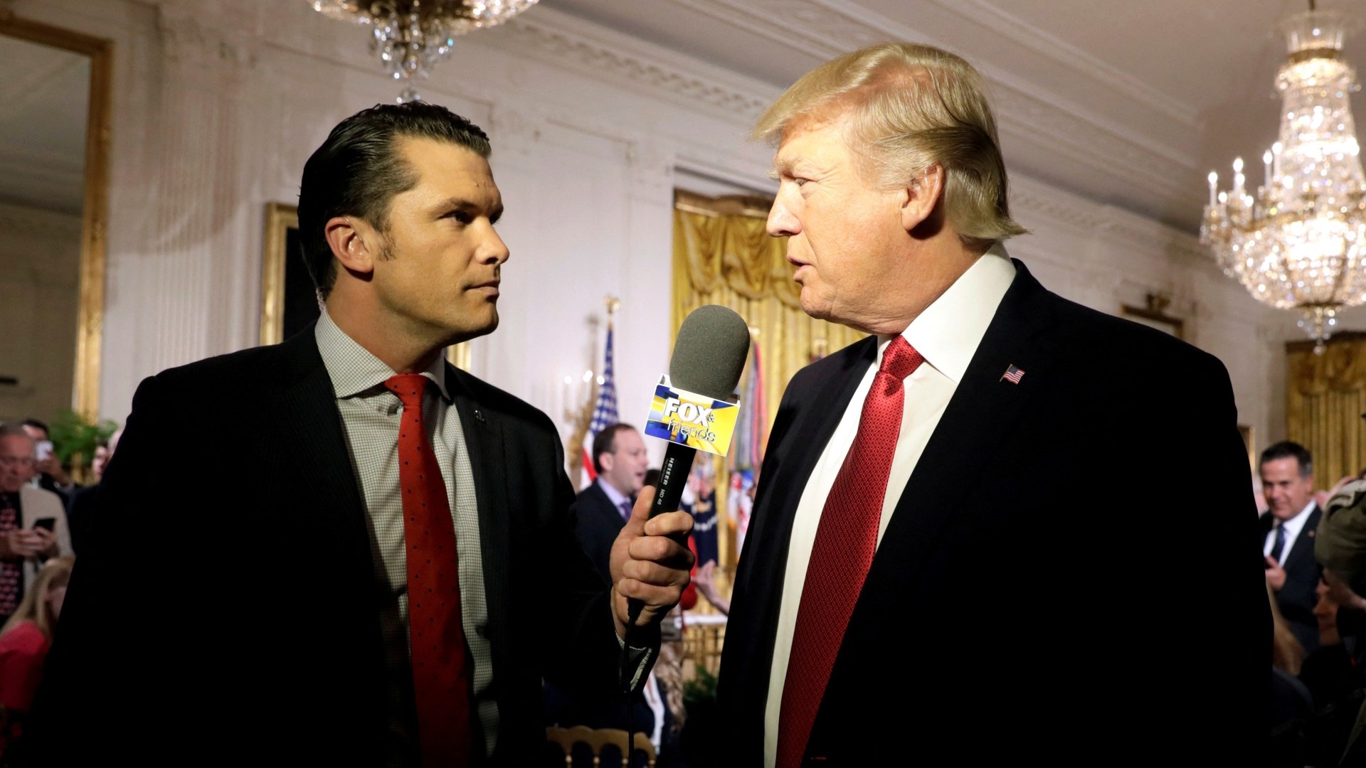 Donald Trump is interviewed by Pete Hegseth at the White House in Washington in 2017 (Reuters/Kevin Lamarque)