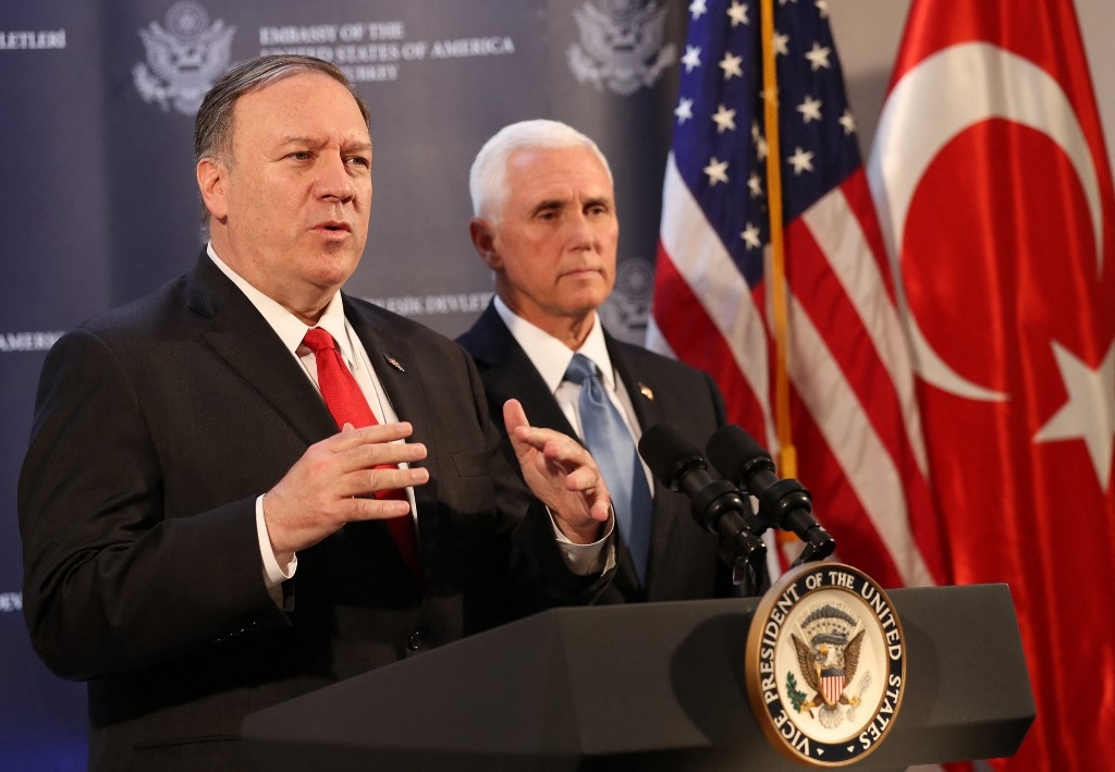 Then-US Vice President Mike Pence (R) and then-US Secretary of State Mike Pompeo (L) attend a press conference after a meeting with Turkish President, in Ankara, Turkey, on October 17, 2019.