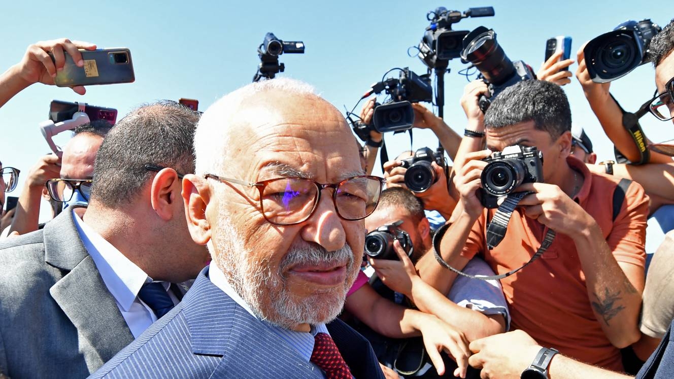 Rached Ghannouchi, head of Tunisia's Ennahda party, arrives at the office of Tunisia's counter-terrorism prosecutor in Tunis (AFP)