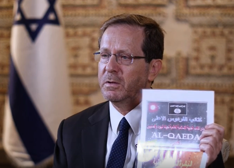 Israeli President Isaac Herzog produces a page from the al-Qaeda document on Sky News (screengrab)