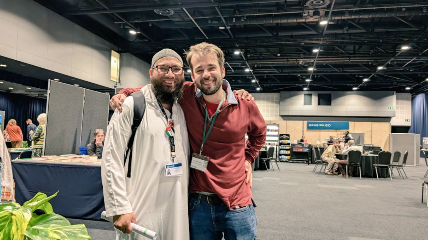 Councillor Mothin Ali, member of Muslim Greens, and Joshua Alston, member of Jewish Greens, pose for a photo at the party conference. Both members of Greens for Palestine