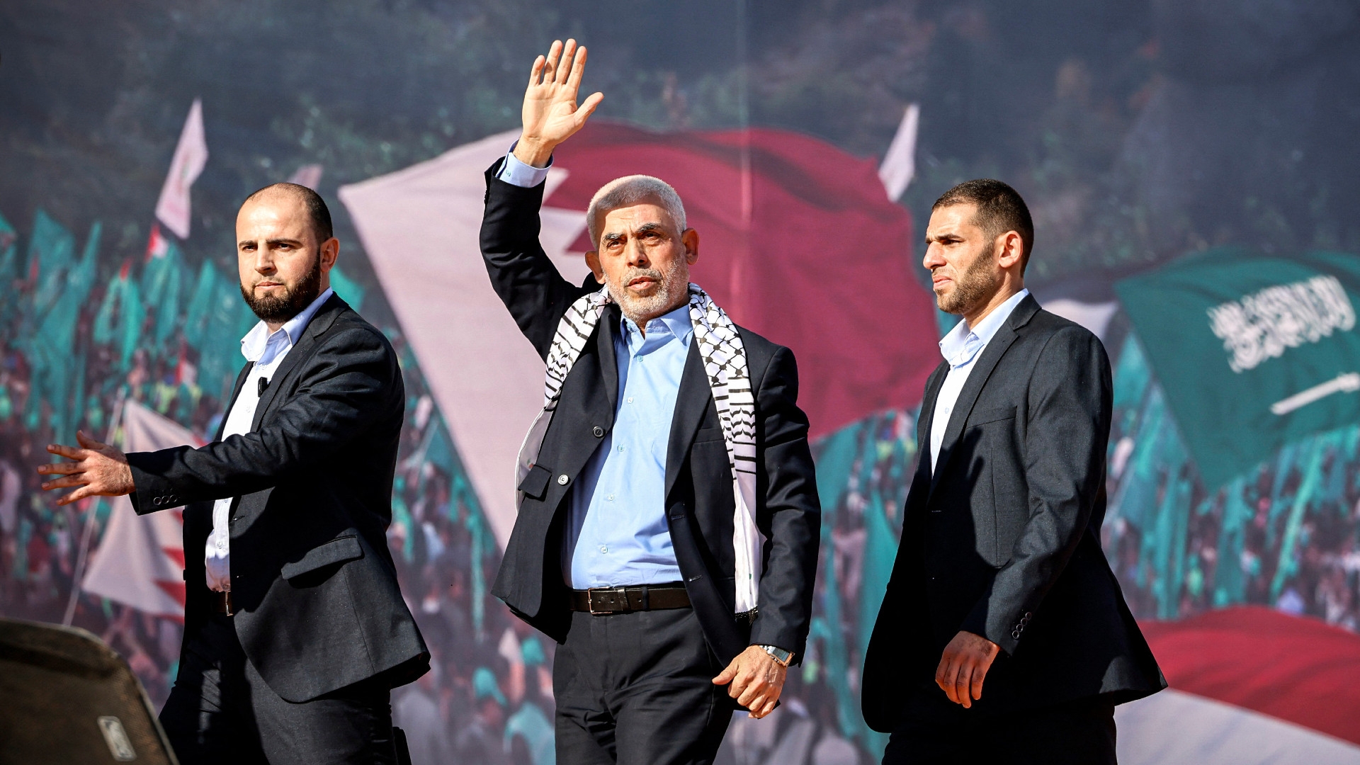 Yahya Sinwar, the recently appointed political leader of Hamas, appears before supporters during a rally marking the 35th anniversary of the group's foundation, in Gaza City on 14 December 2022. (Mohammed Abed/AFP)