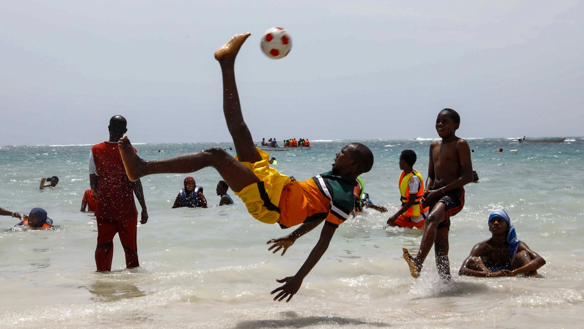 Youths play on a Mogadishu beach. More Turkish warships may soon be patrolling these waters (Reuters/Feisal Omar)