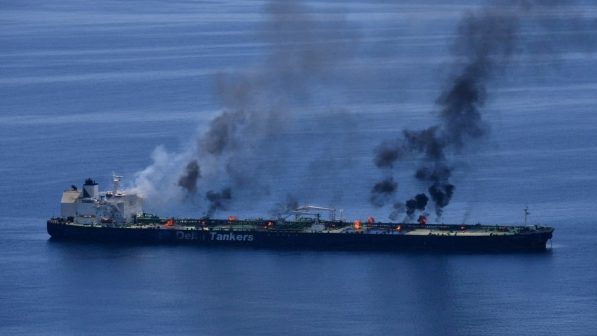 Flames and smoke rise from the Greek-flagged oil tanker Sounion, which has been on fire since 23 August (Eunavfor Aspides/Reuters)