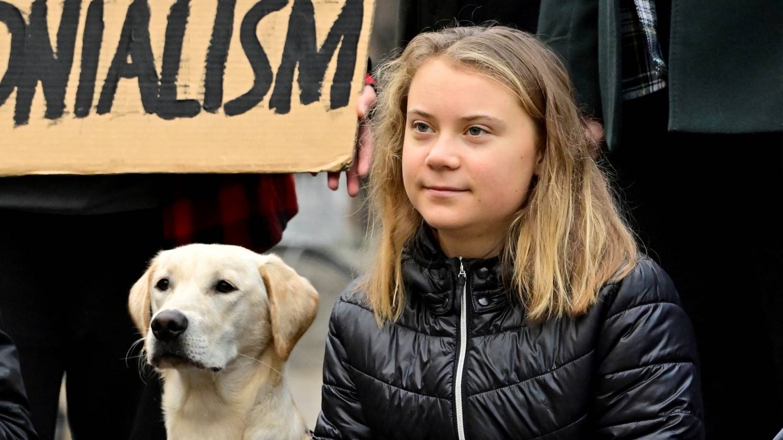 Swedish climate activist Greta Thunberg attends a 'Fridays for Future' movement protest in Stockholm, Sweden, 13 October 2022 (AFP)