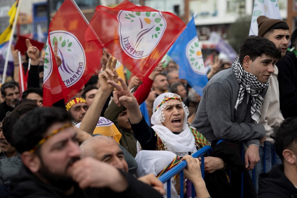 Supporters of the pro-Kurdish Dem Party attend a rally in Esenyurt Square, in Istanbul on 25 February (Yasin Akgul/AFP)