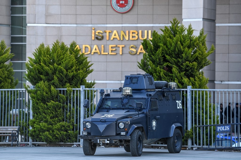 An armored Turkish police vehicle stands outside the courthouse in Istanbul on March 28, 2019,