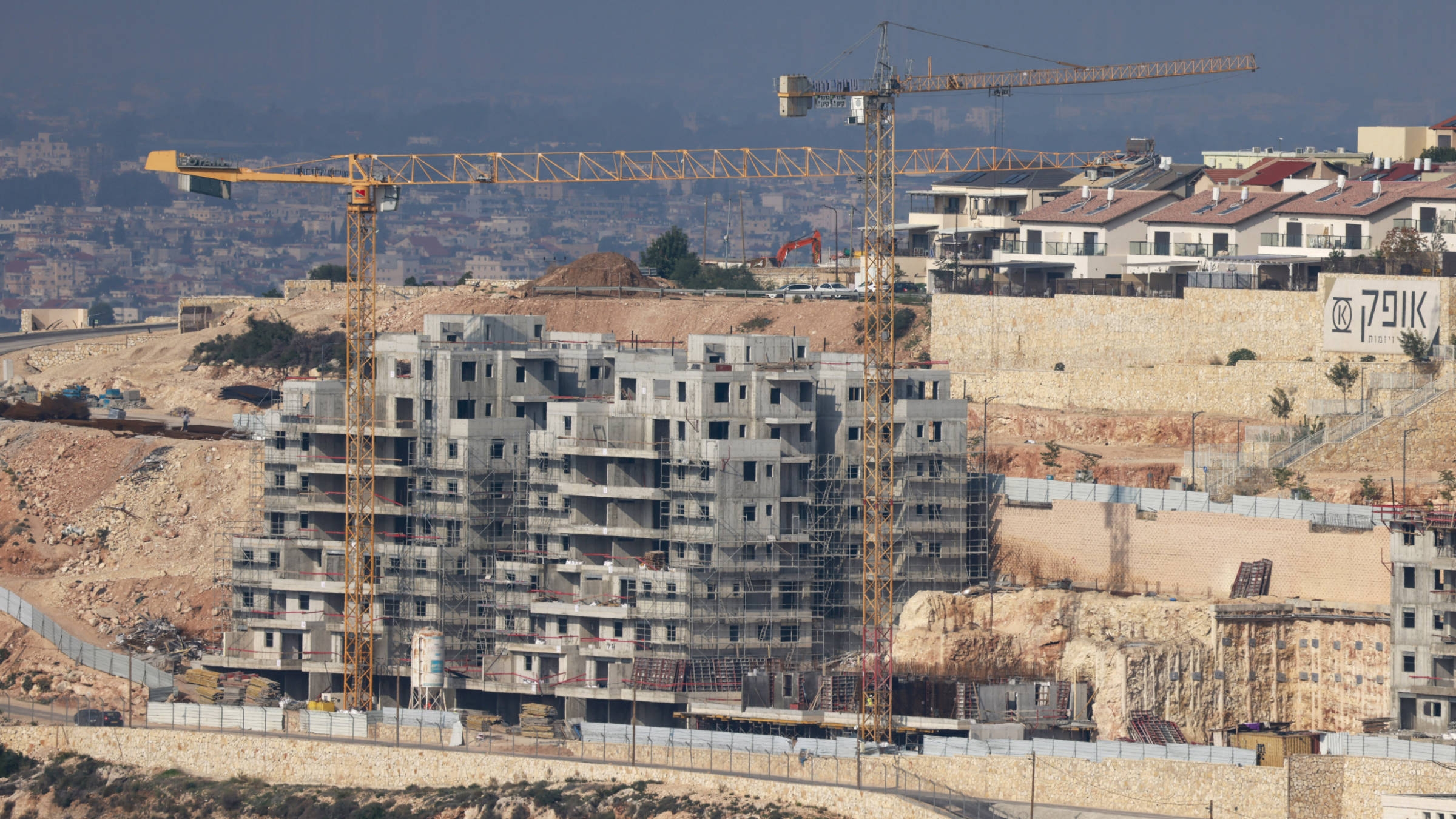 A general view shows the construction work happening in the settlement of Tzofim, east of the Palestinian West Bank village of Qalqiliya on 2 January 2024 (AFP)