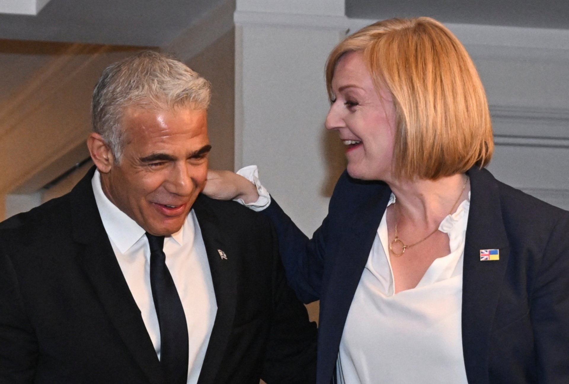 Israeli Prime Minister Yair Lapid, left, with British counterpart Liz Truss at the UN General Assembly in New York in September 2022 (Reuters)