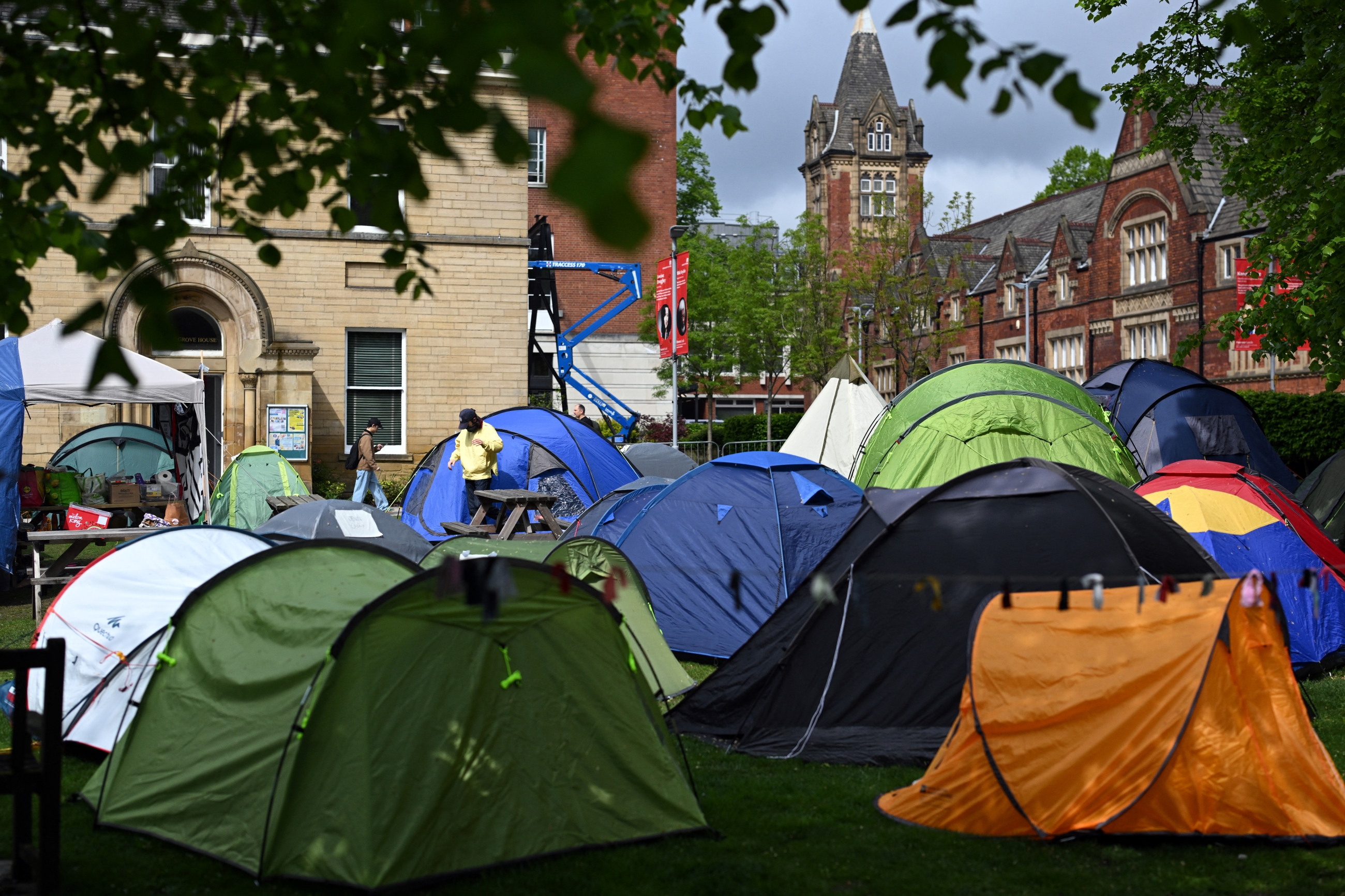 Students set up tents as part of the Leeds University pro-Palestine encampment (Oli Scarff/AFP)