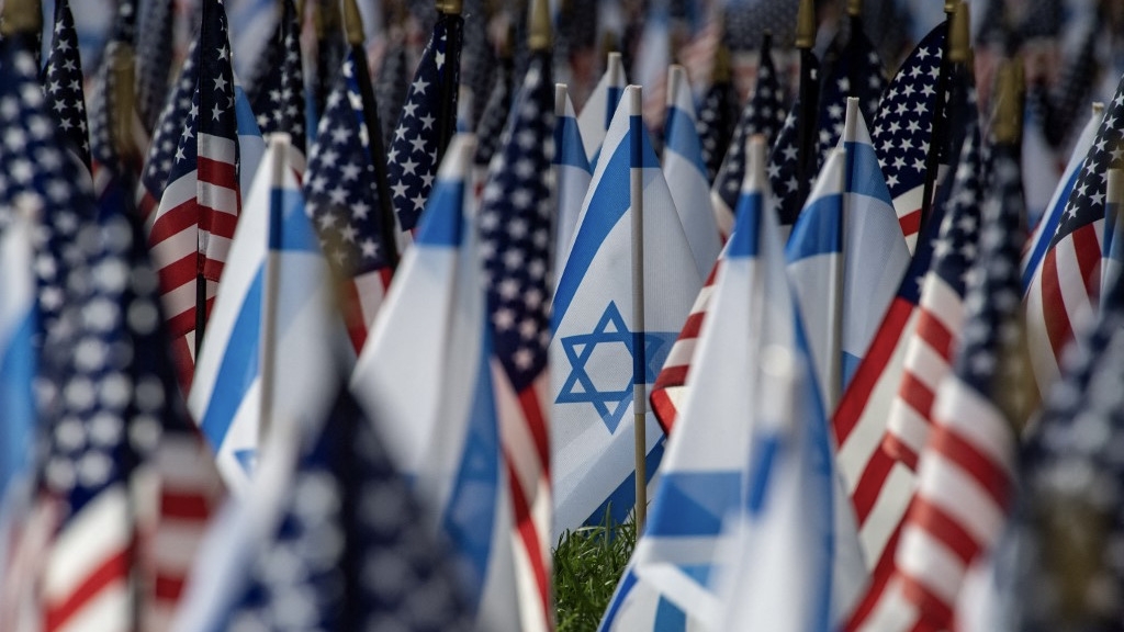 US and Israeli flags fill the field at Statler Park in Boston, Massachusetts, on 18 October 2023 (Joseph Prezioso/AFP)