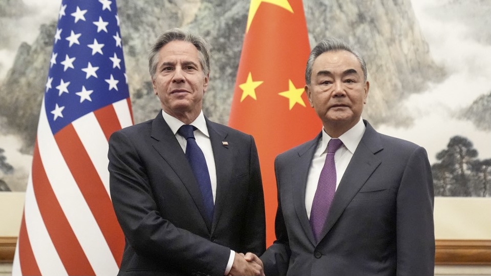 US Secretary of State Antony Blinken and Chinese Foreign Minister Wang Yi shake hands at the Diaoyutai State Guesthouse in Beijing on 26 April 2024 (Mark Schiefelbein/AFP)