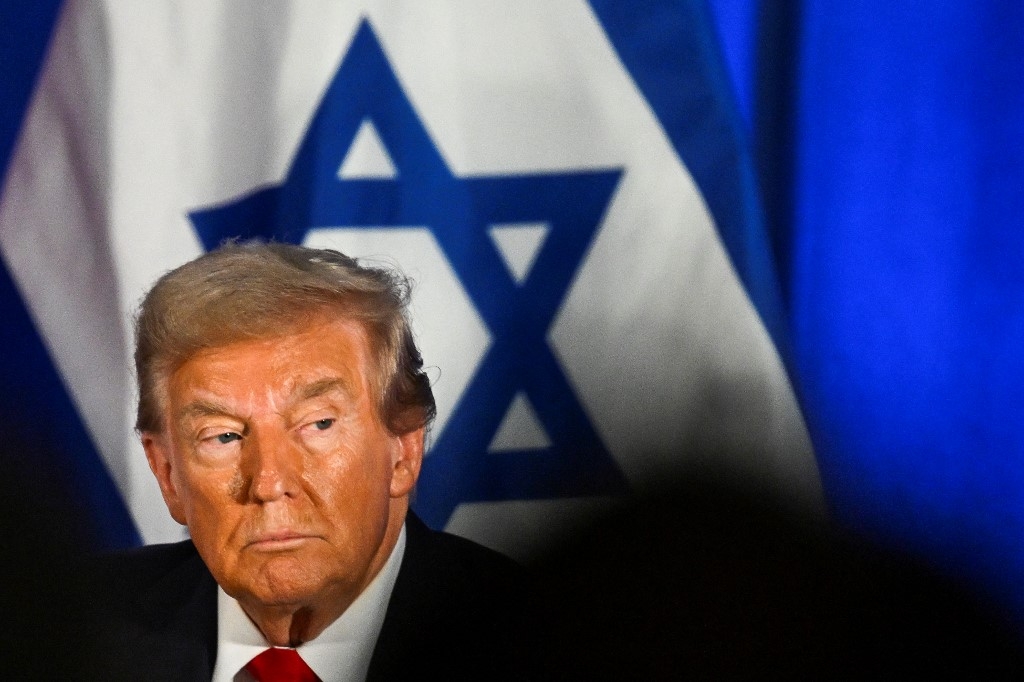 Former US President and Republican presidential candidate Donald Trump attends a remembrance event to mark the first anniversary of the Hamas attack on Israel at Trump National Doral golf club in Miami, Florida, on October 7, 2024. (Chandan Khanna / AFP) 