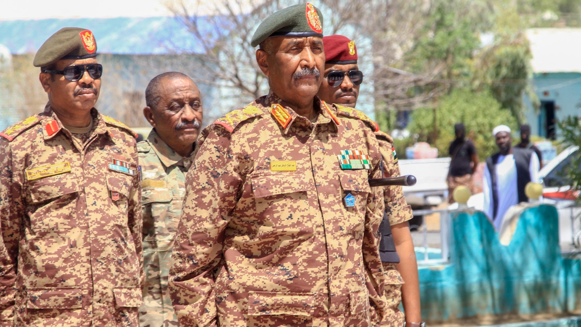 Sudanese army chief Abdel Fattah al-Burhan visits a hospital in Gedaref state in eastern Sudan on 10 April 2024 (AFP)