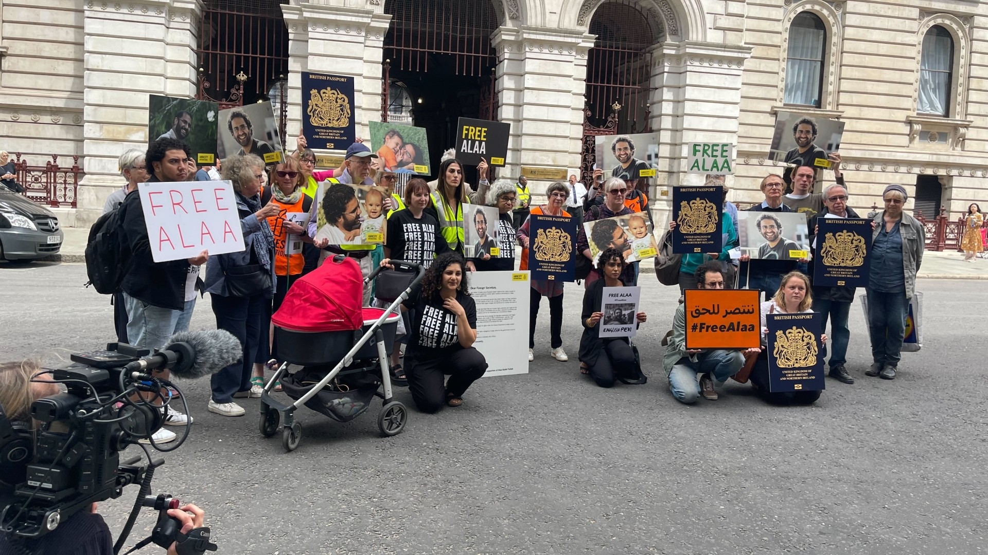 Protesters gather outside the Foreign, Commonwealth and Development Office in Whitehall, London, on 3 July 2023 to raise the plight of jailed British writer Alaa Abd el-Fattah (MEE/Rayhan Uddin)