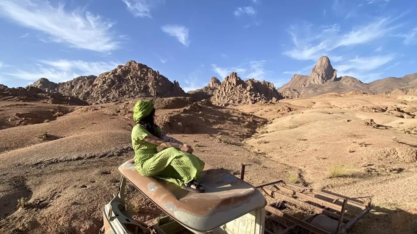 Romanian globetrotter Laura Ioana Isac at the gateway to the Algerian desert in April (provided)