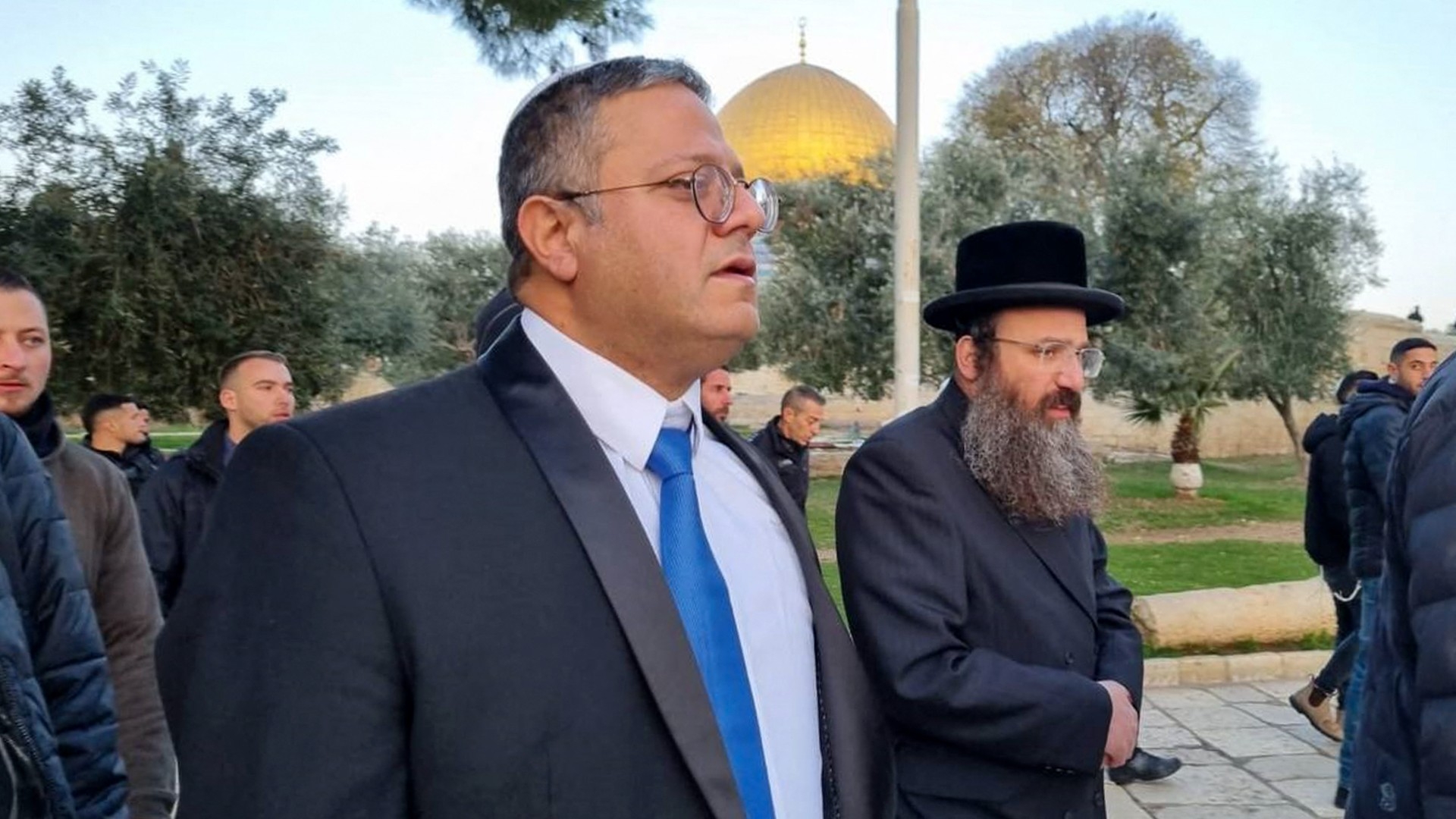 Israeli minister Itamar Ben-Gvir walking through the courtyard of Jerusalem's Al-Aqsa mosque compound on 3 January 2023 (AFP/Minhelet Har-Habait)