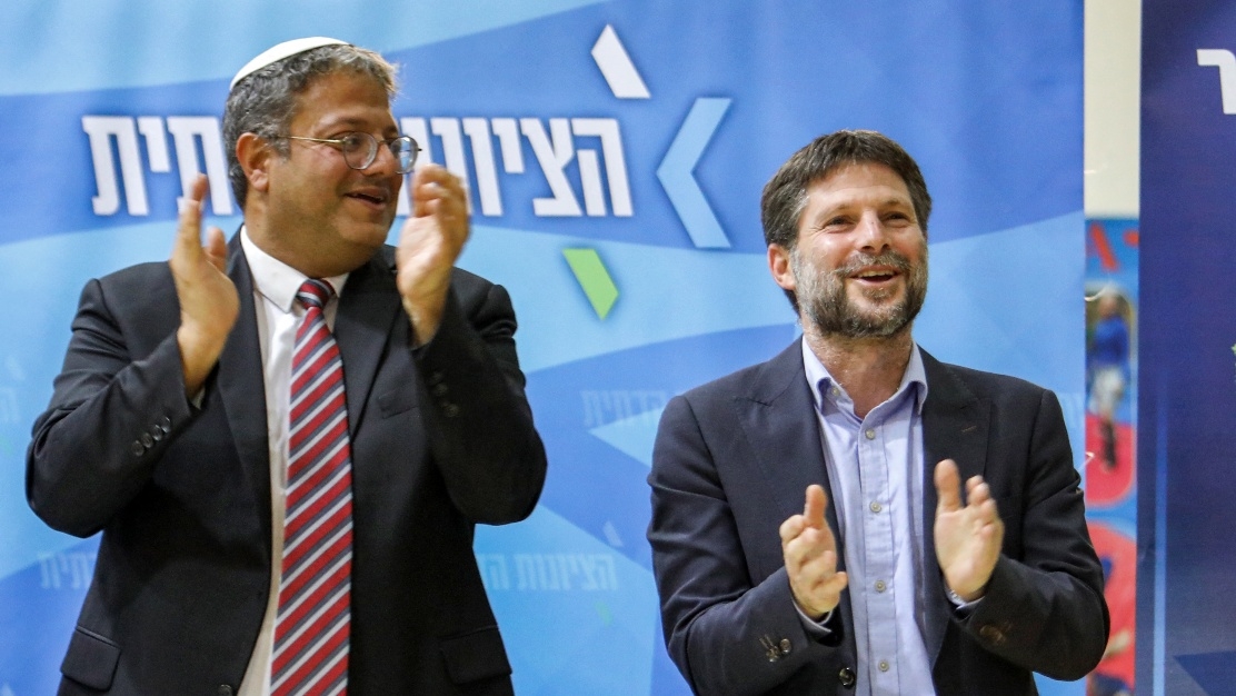 (L to R) Right-wing Israel lawmakers Itamar Ben-Gvir and Bezalel Smotrich attend a rally on 26 October 2022.