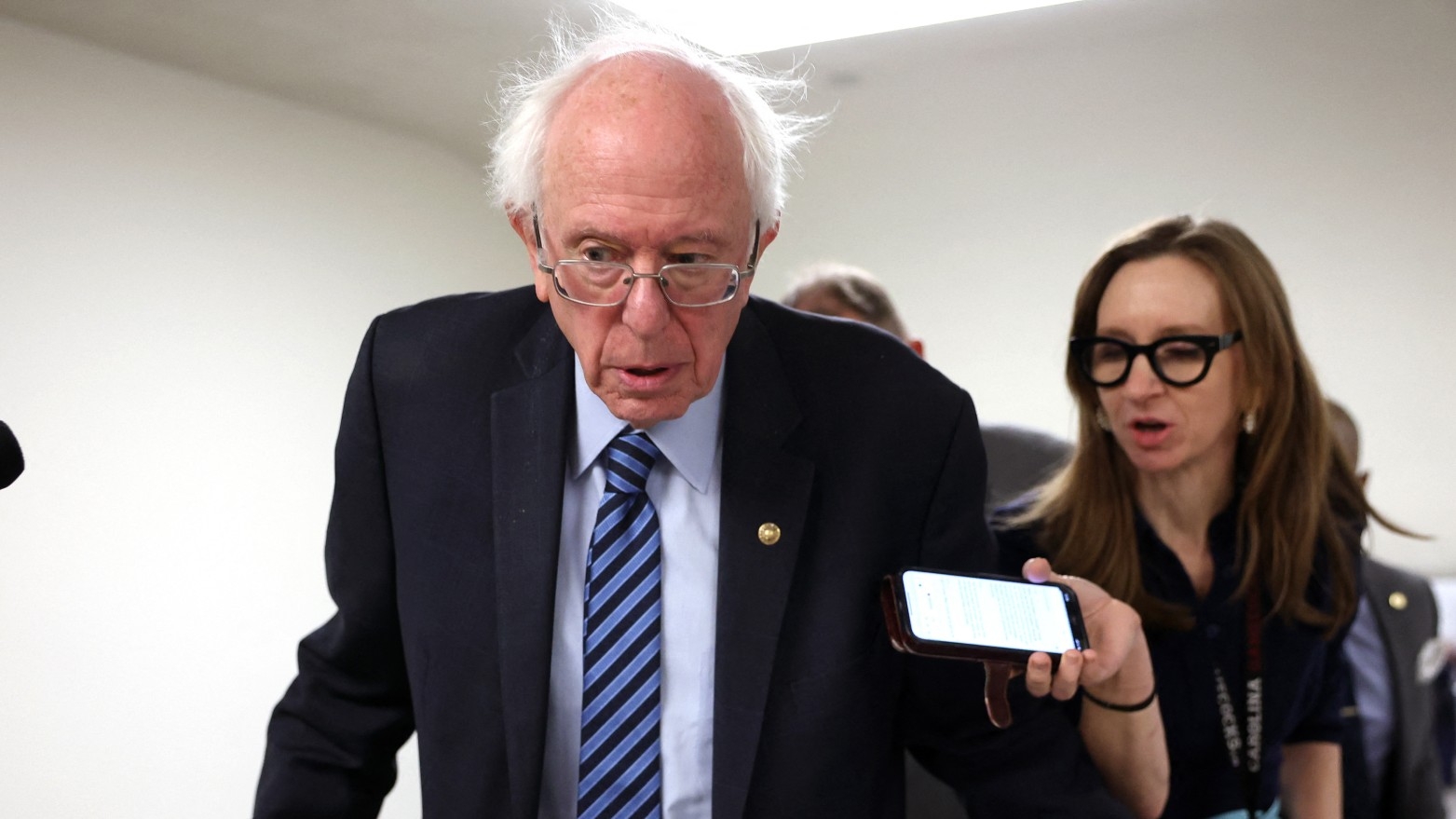 US Senator Bernie Sanders speaks to reporters before a Senate luncheon at the US Capitol on 12 December 2023 in Washington.