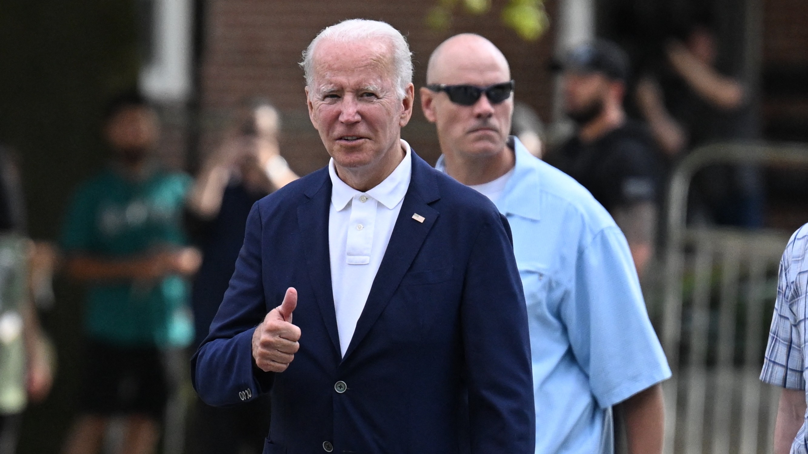 US President Joe Biden departs following mass at St Anthony of Padua church in Wilmington, Delaware, 12 June 2022. (AFP)