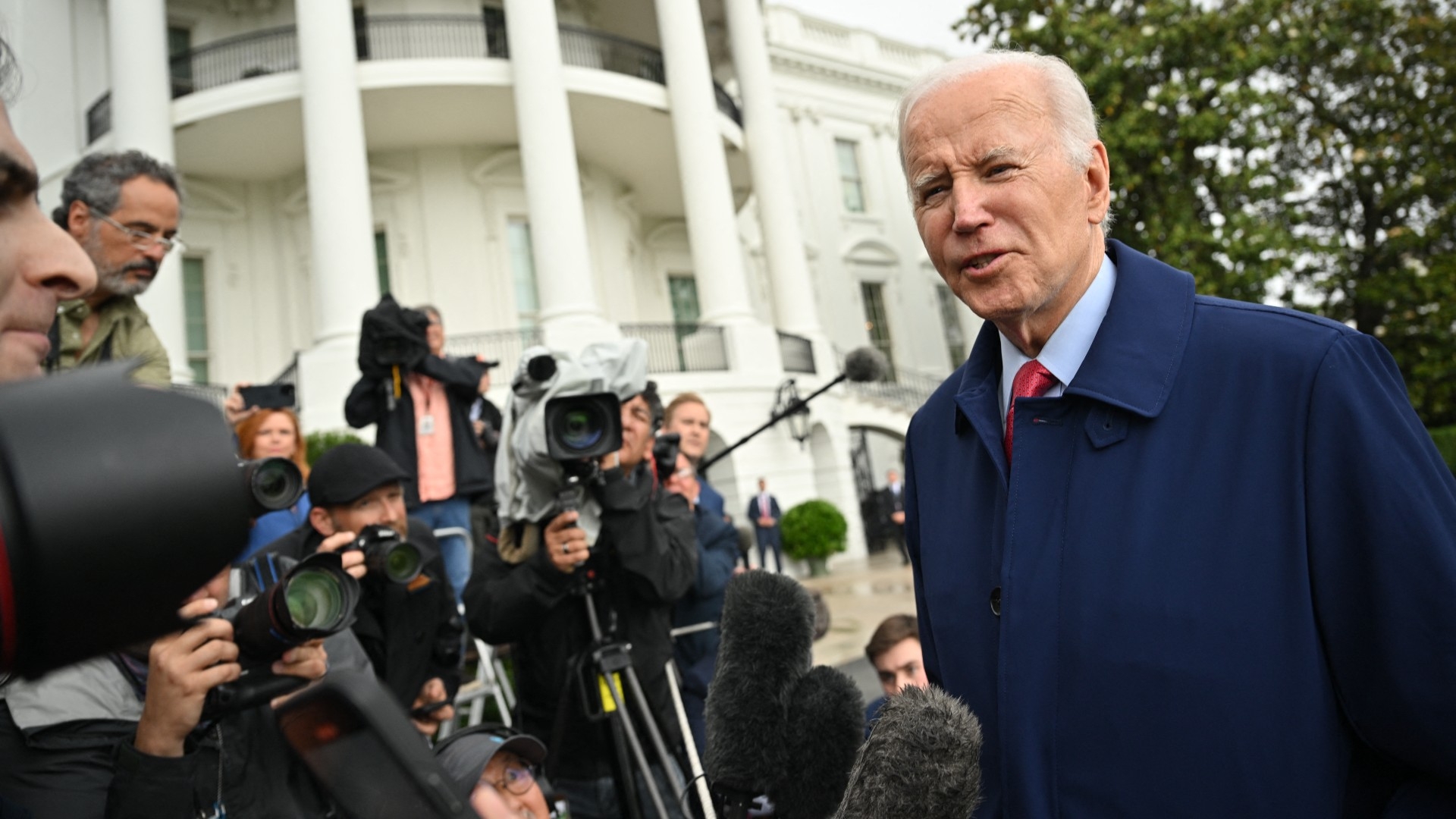 US President Joe Biden speaks to members of the media on the South Lawn of the White House in Washington on 29 May 2023 (AFP)