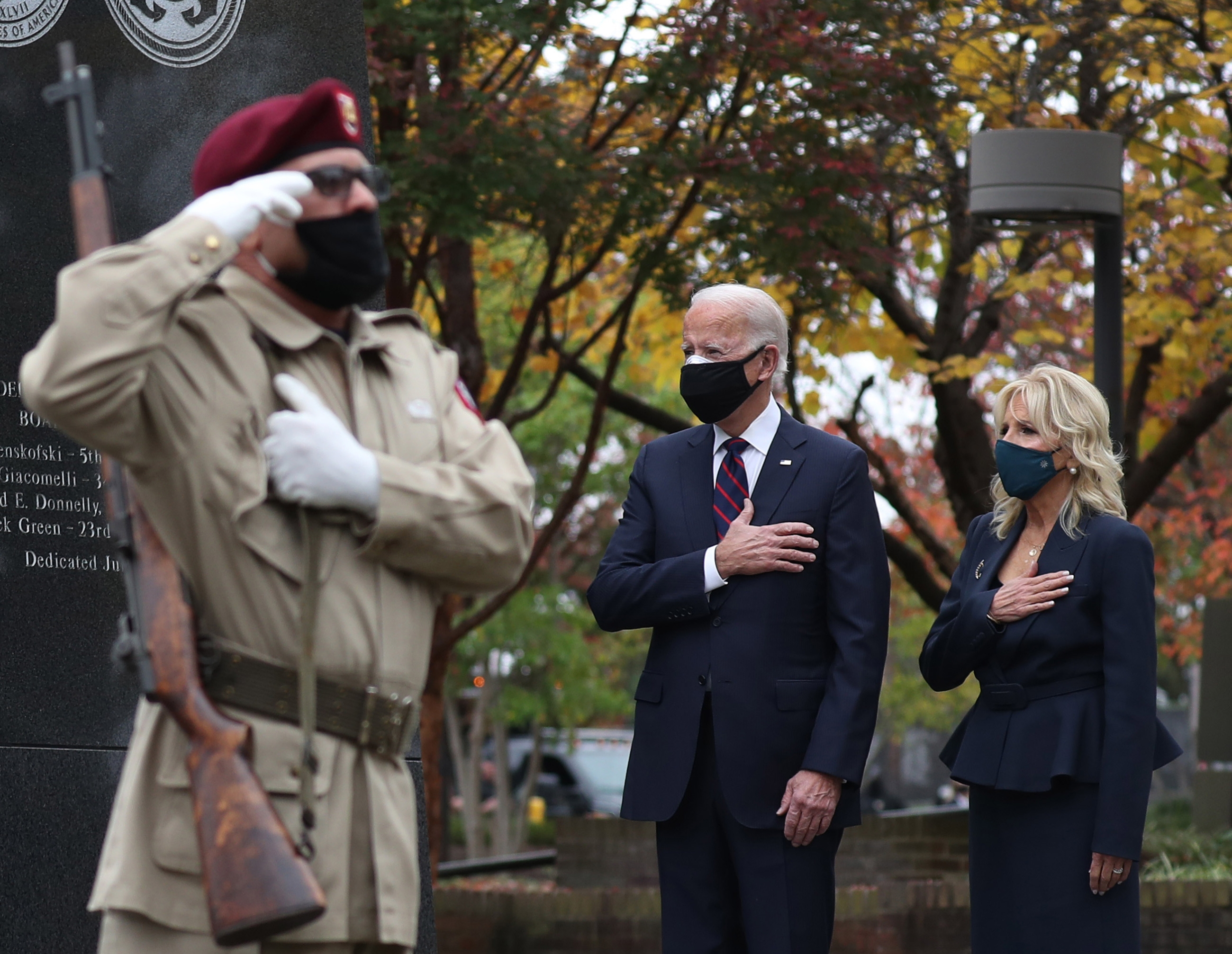Joe Biden and his wife Jill pay respects during a Veterans Day stop at the Korean War Memorial Park in Philadelphia, Pennsylvania on 11 November.