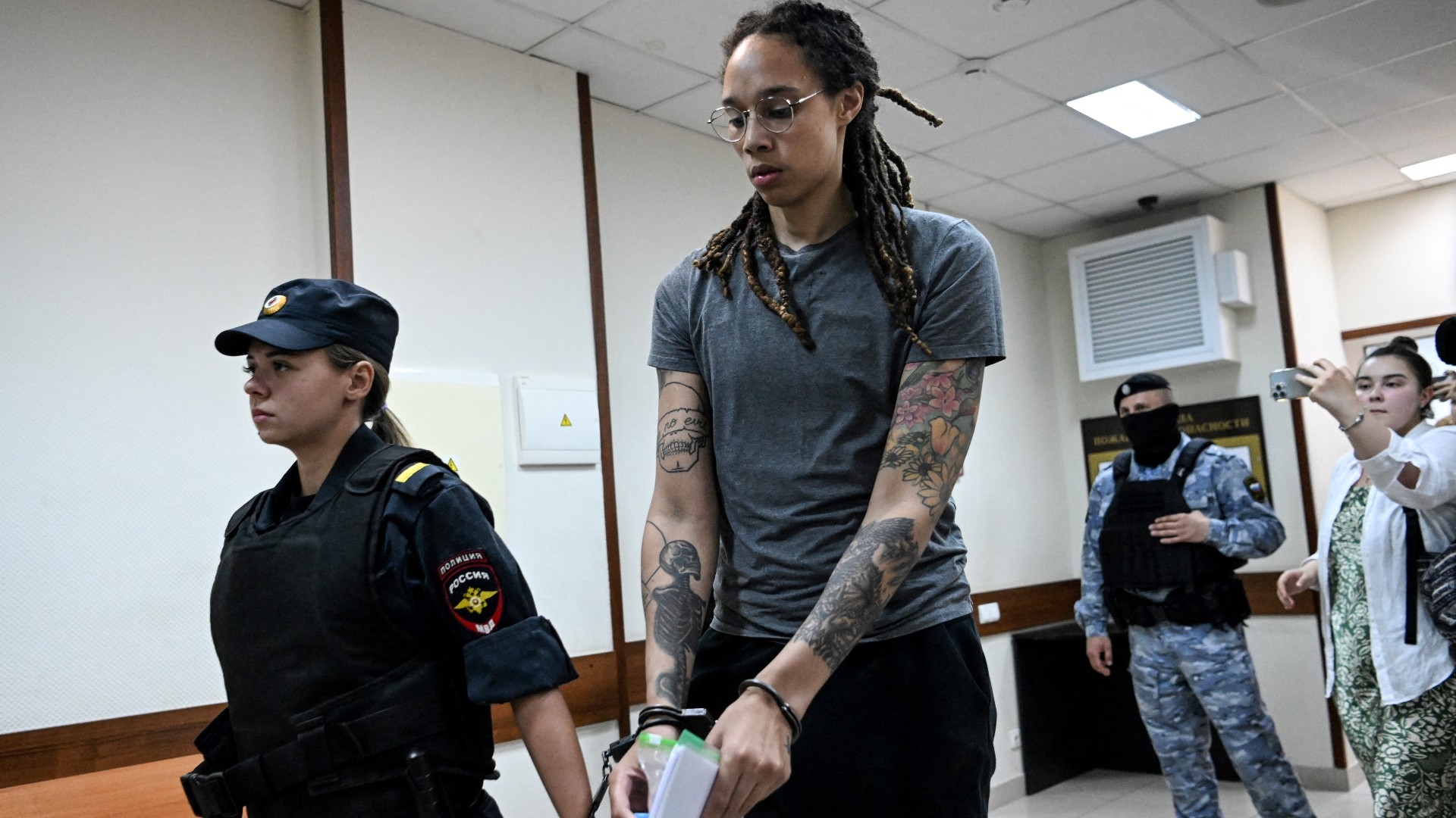 US basketball player Brittney Griner leaves the courtroom before the court's final decision in Khimki outside Moscow on 4 August 2022 (AFP)