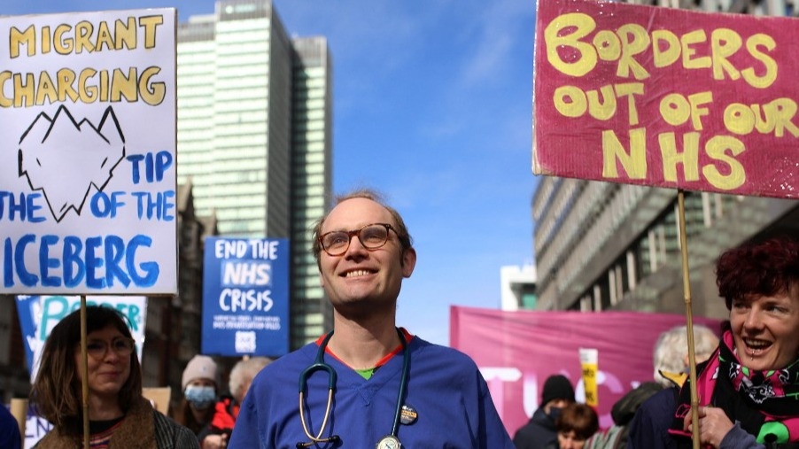 A rally in support of Britain's National Health Service calling for improved pay for its staff, London, 11 March 2023 (AFP)