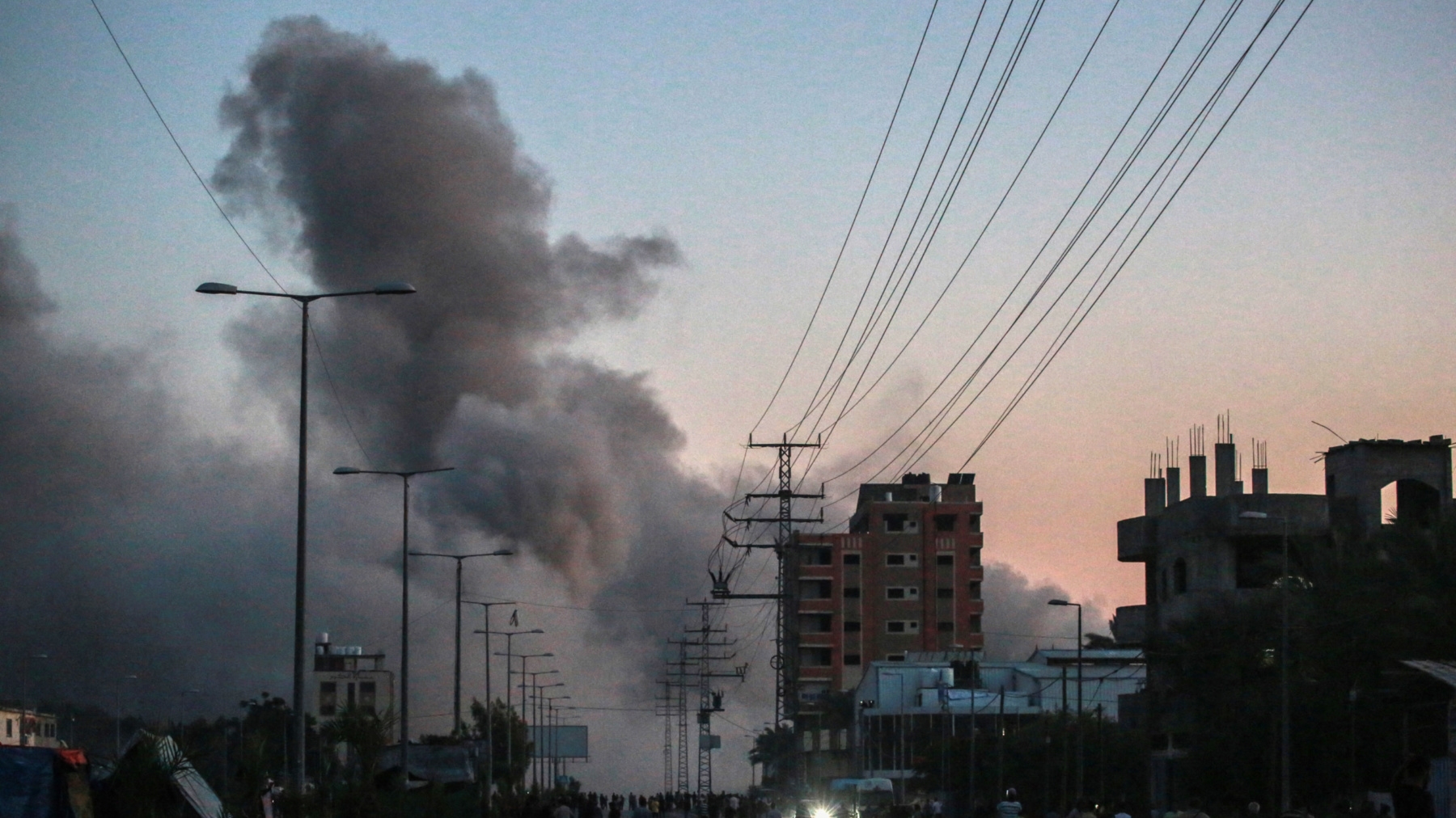 Smoke rises following an Israeli strike on Deir al-Balah, central Gaza on 6 June 2024 (Bashar Taleb/AFP)