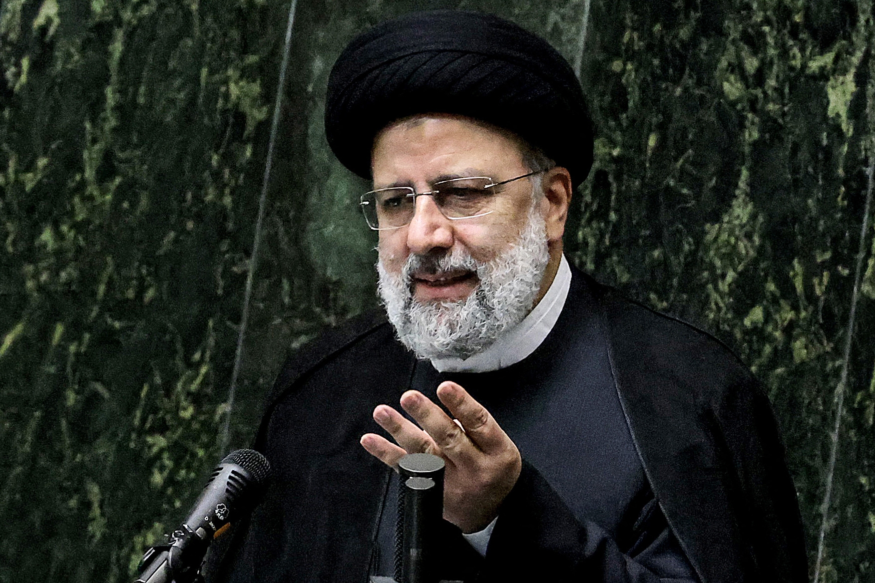 Iran's President Ebrahim Raisi speaks before parliament to defend his cabinet selection in the capital Tehran on 21 August 2021.