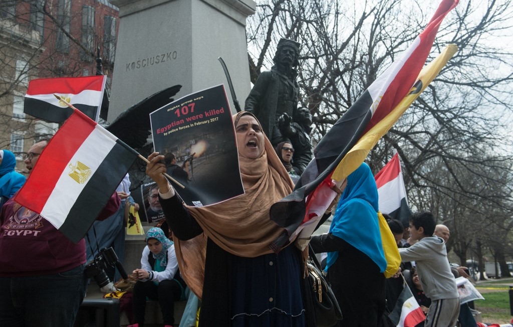 Opponents of Egyptian President Abdel Fattah el-Sisi protest during his meeting with then-US President Donald Trump at the White House on 3 April 2017.