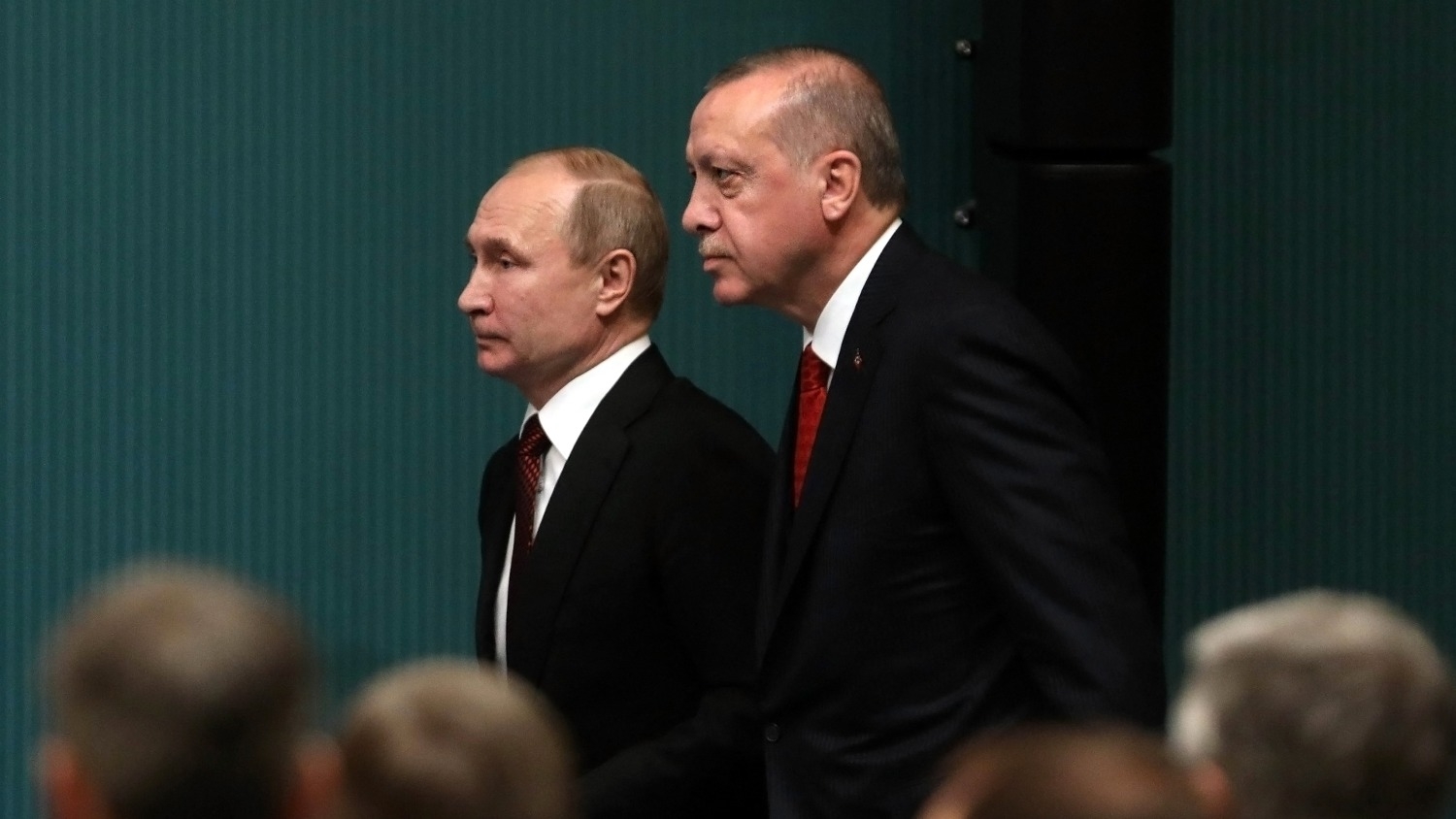 Russian President Vladimir Putin and Turkish President Recep Tayyip Erdogan arrive to hold a joint press conference at the Presidential Complex in Ankara on 3 April 2018.