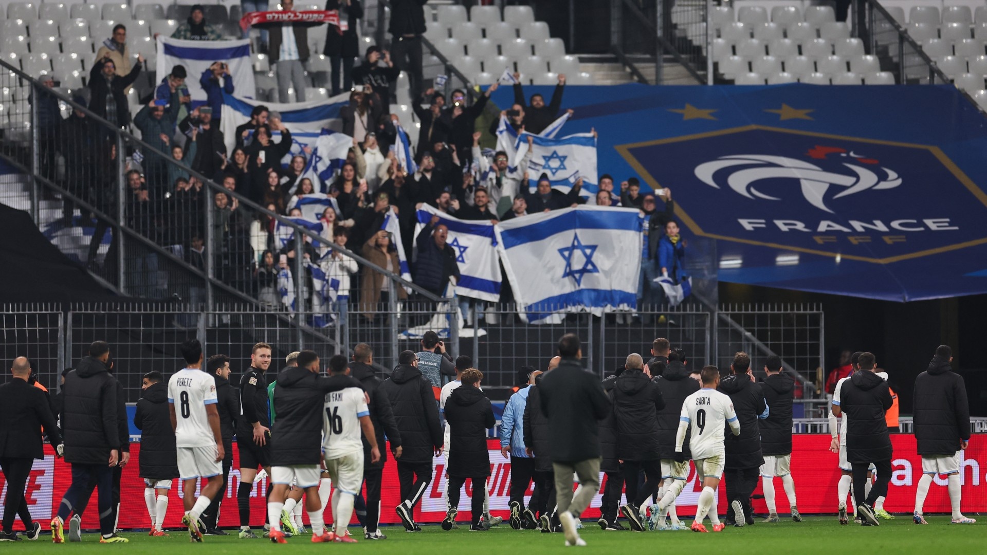 Israel's team greets their supporters after a football match against France at The Stade de France stadium in Saint-Denis, in the northern outskirts of Paris, on 14 November 2024 (AFP/Franck Fife)